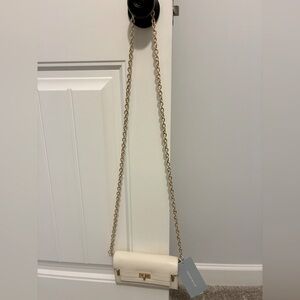 Cream color clutch/wallet completely adjustable by Antonio Melani.